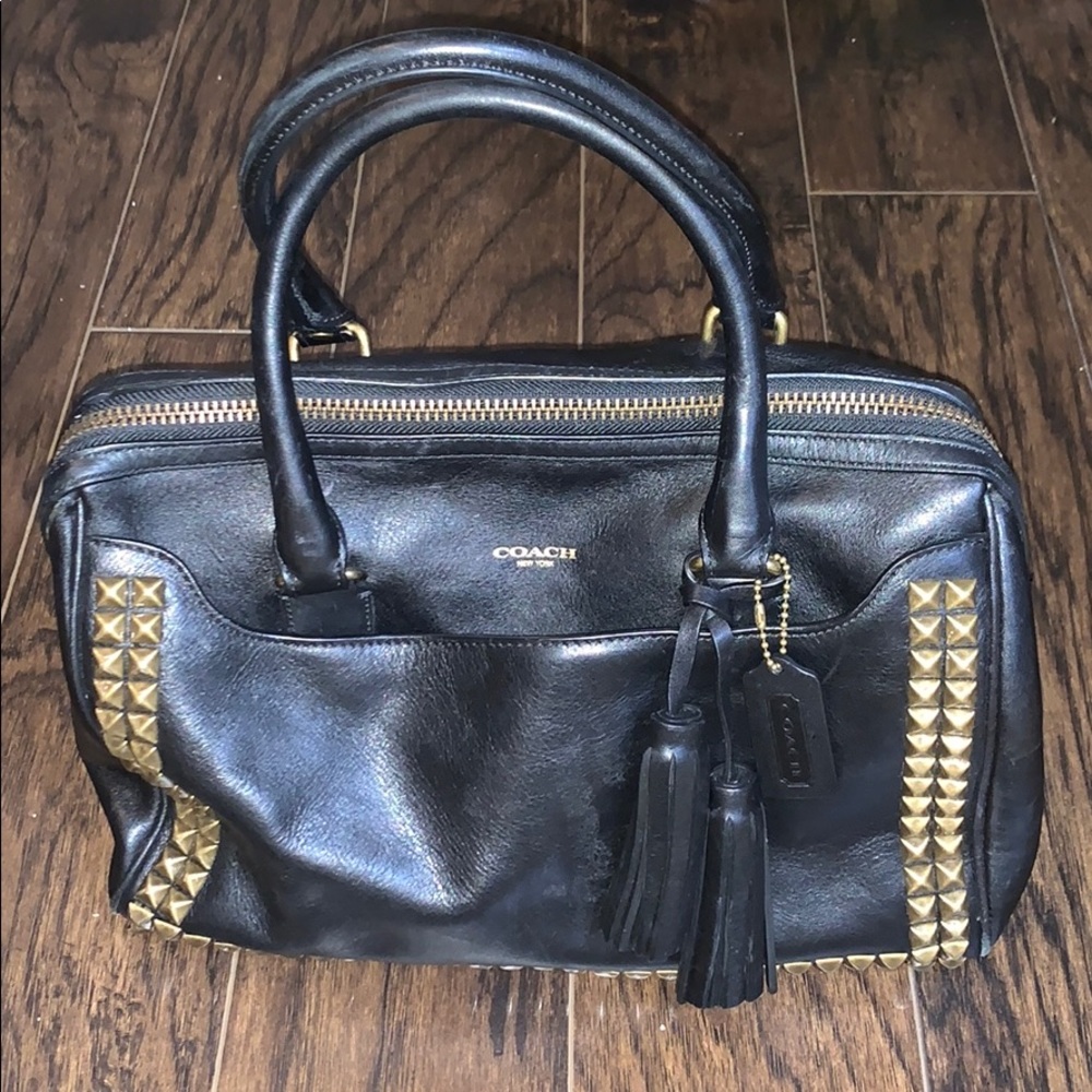 Black leather Coach purse with studs